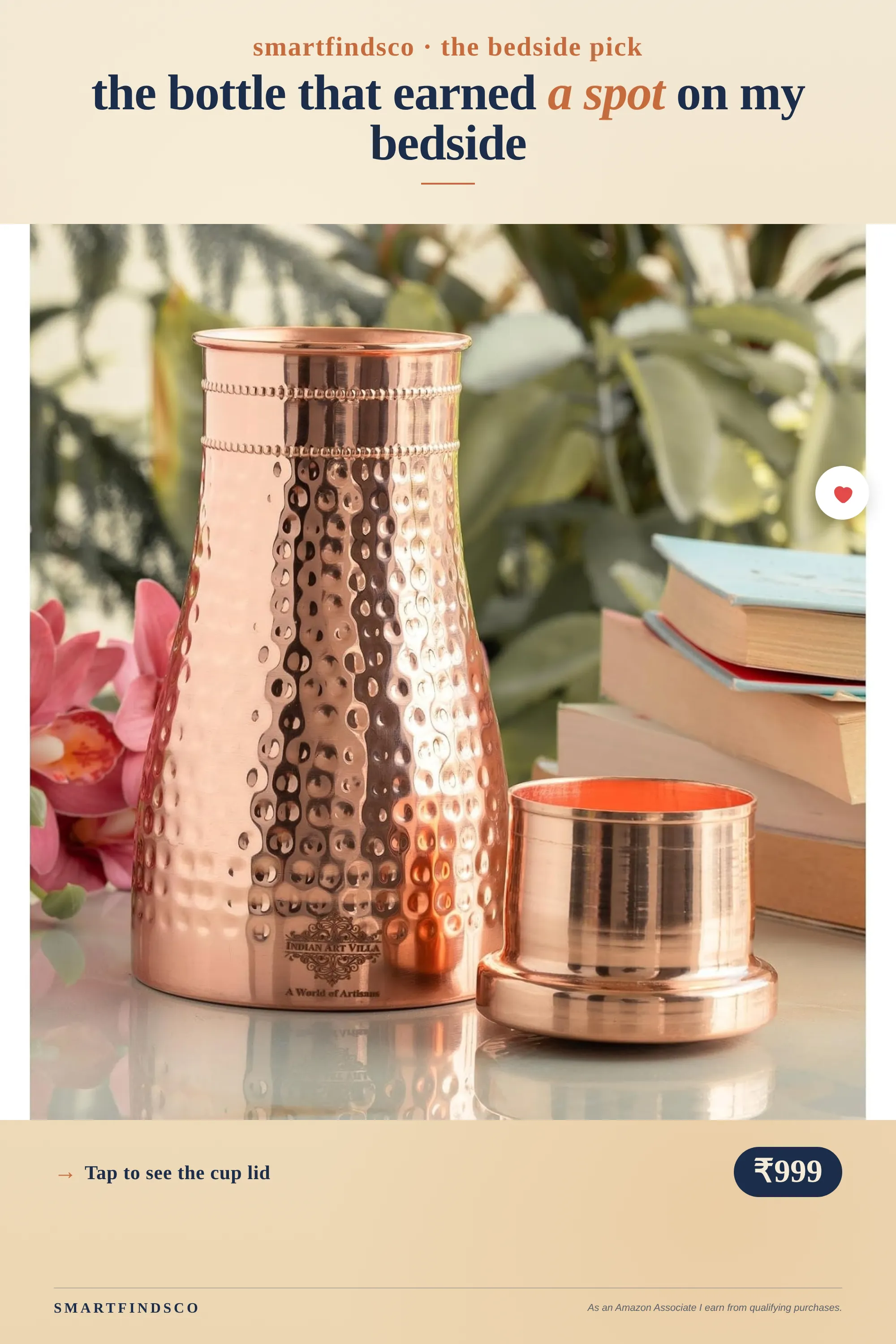 Hammered copper water bottle with cup-style lid on a bedside table next to a lotus flower and a stack of books.
